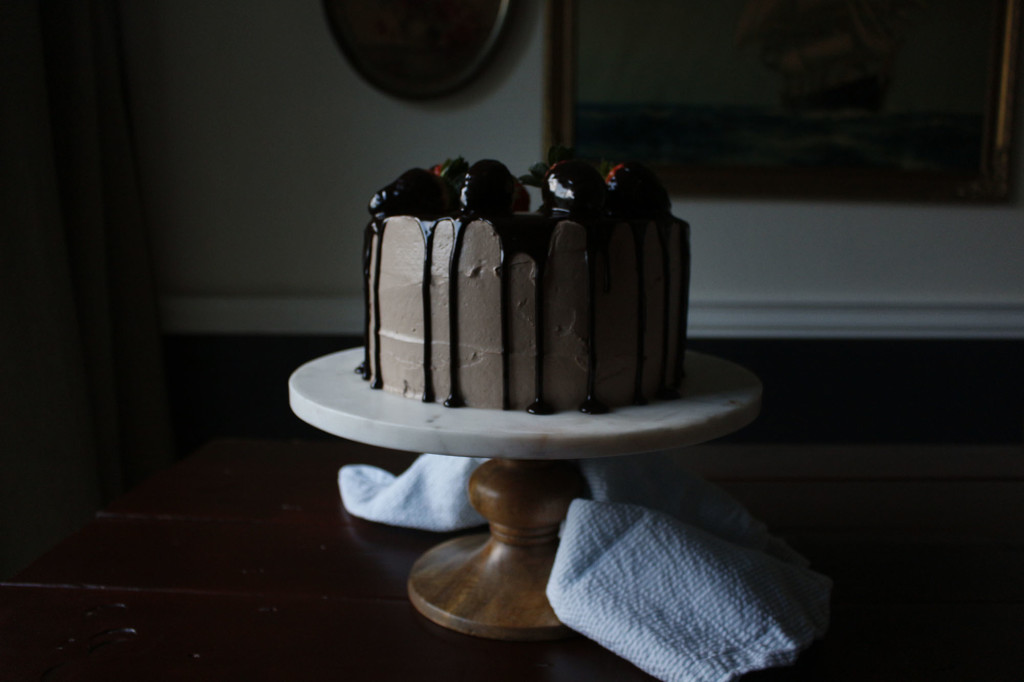 Chocolate Dipped Strawberry Cake. A romantic, dense and fluffy chocolate cake with a ganache meringue frosting.
