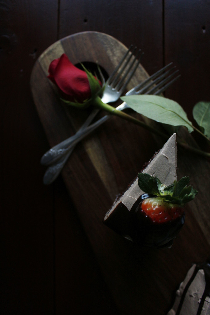 Chocolate Dipped Strawberry Cake. A romantic, dense and fluffy chocolate cake with a ganache meringue frosting.