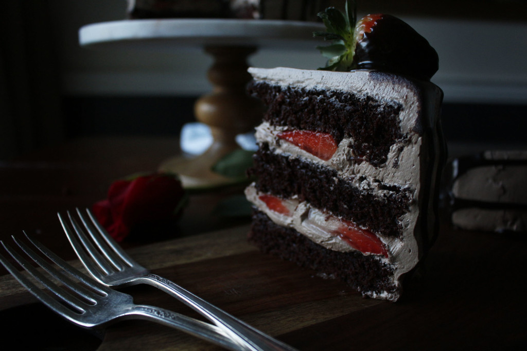 Chocolate Dipped Strawberry Cake. A romantic, dense and fluffy chocolate cake with a ganache meringue frosting.