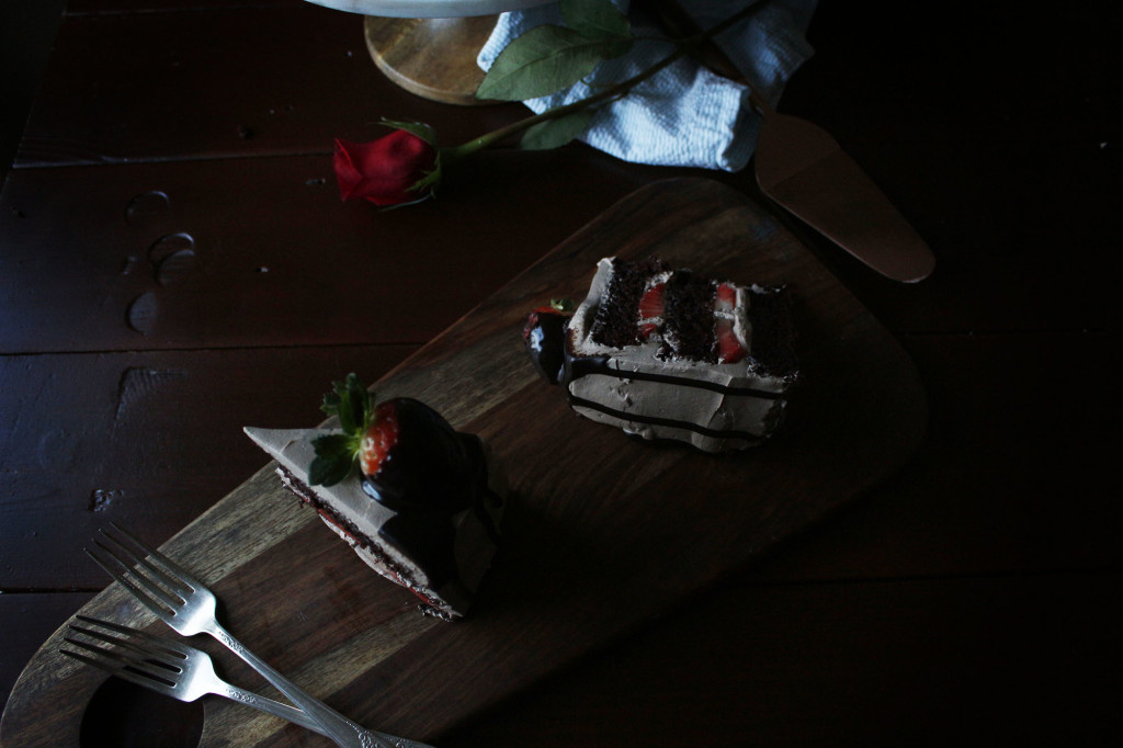 Chocolate Dipped Strawberry Cake. A romantic, dense and fluffy chocolate cake with a ganache meringue frosting.