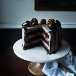 Chocolate Dipped Strawberry Cake. A romantic, dense and fluffy chocolate cake with a ganache meringue frosting.