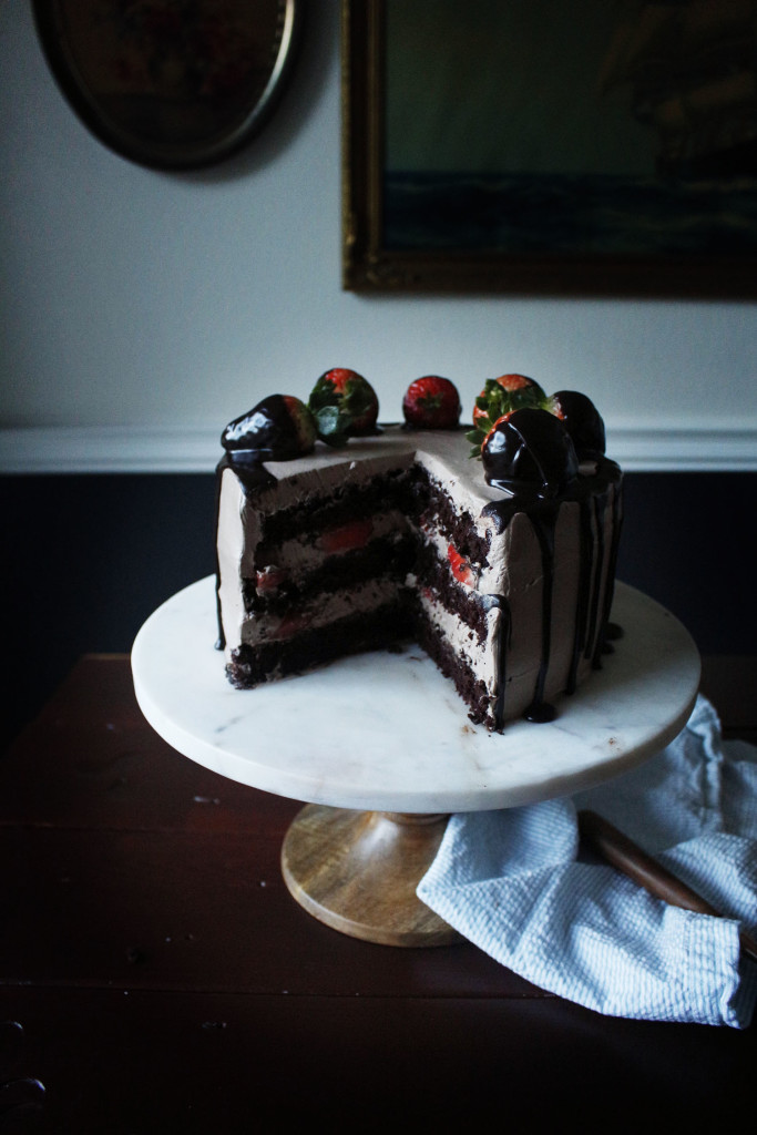 Chocolate Dipped Strawberry Cake. A romantic, dense and fluffy chocolate cake with a ganache meringue frosting.