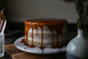 Browned butter cake with a light whipped salted american butter cream and salted bourbon caramel drizzle.