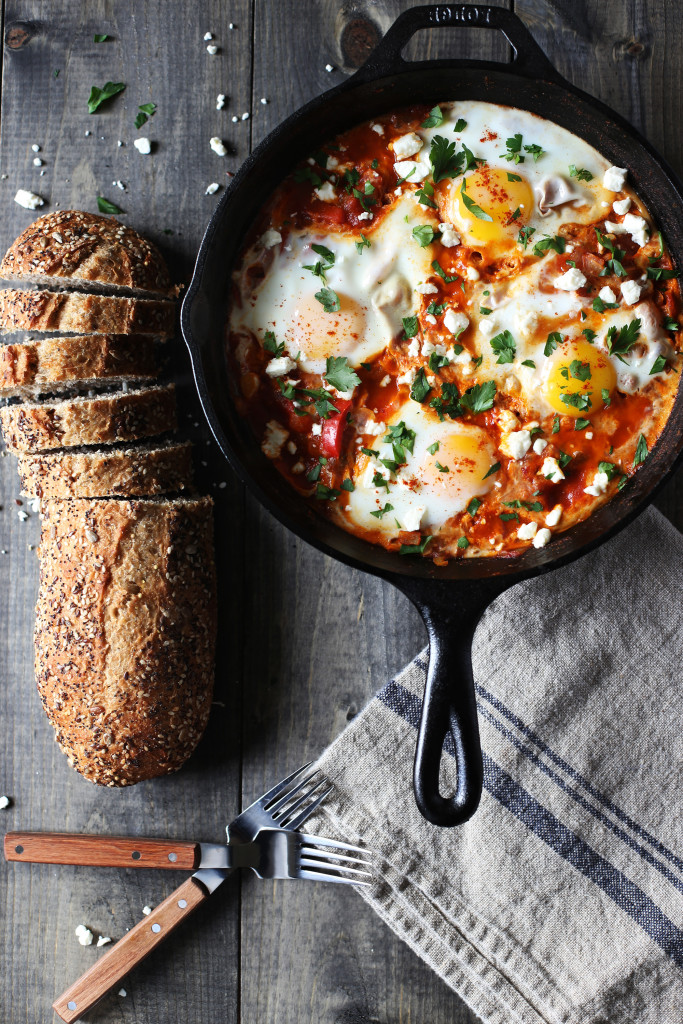 Shakshuka for two! Poached eggs in a tomato sauce warmed with cumin and smoked paprika sprinkled with feta cheese.