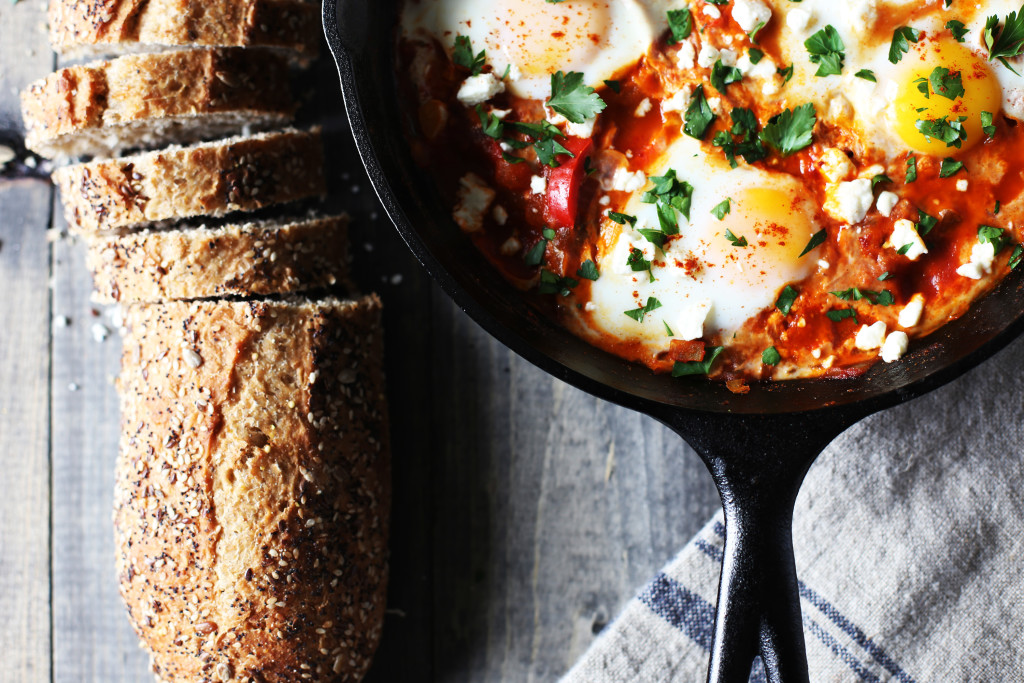 Shakshuka for two! Poached eggs in a tomato sauce warmed with cumin and smoked paprika sprinkled with feta cheese.