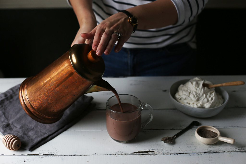 Cardamom and Honey Hot Chocolate, perfect for raining days and reading a book. Light herbal flavors and a fluffy honey whipped topping.