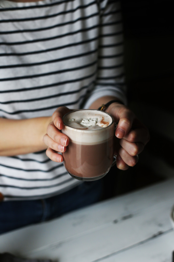 Cardamom and Honey Hot Chocolate, perfect for raining days and reading a book. Light herbal flavors and a fluffy honey whipped topping.