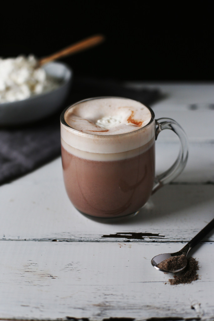 Cardamom and Honey Hot Chocolate, perfect for raining days and reading a book. Light herbal flavors and a fluffy honey whipped topping.