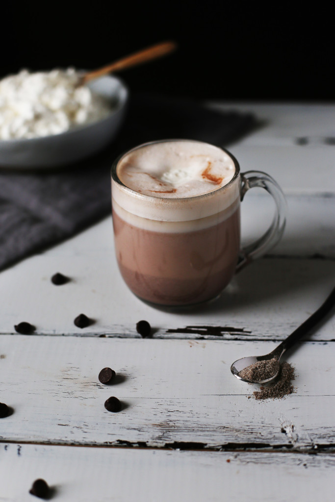 Cardamom and Honey Hot Chocolate, perfect for raining days and reading a book. Light herbal flavors and a fluffy honey whipped topping.