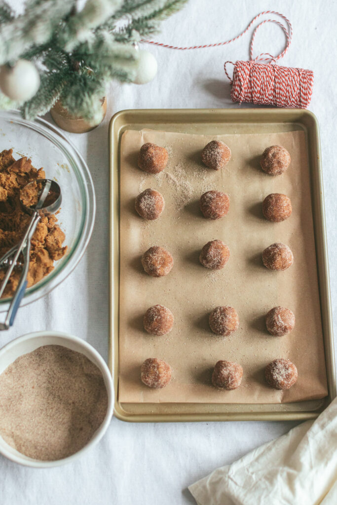 rolled cookies on a cookie sheet