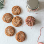 overhead of cookies, some tied up in red and white string