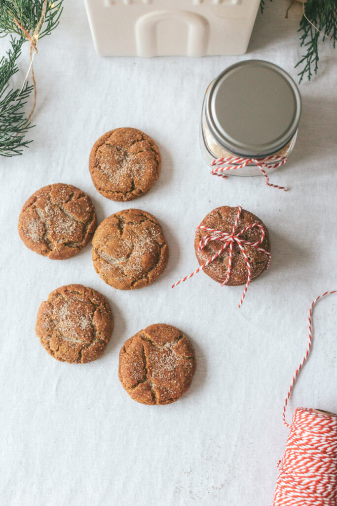 overhead of cookies, some tied up in red and white string