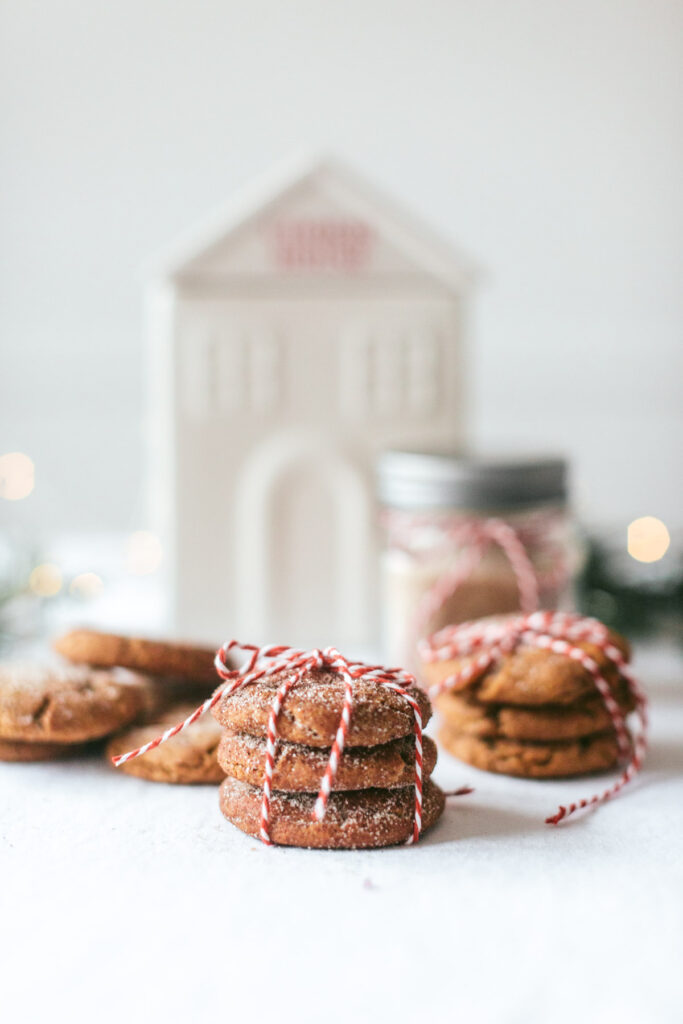 overhead of cookies, some tied up in red and white string