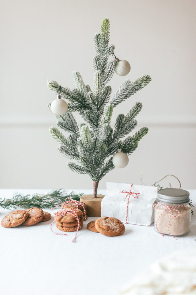 overhead of cookies, some tied up in red and white string