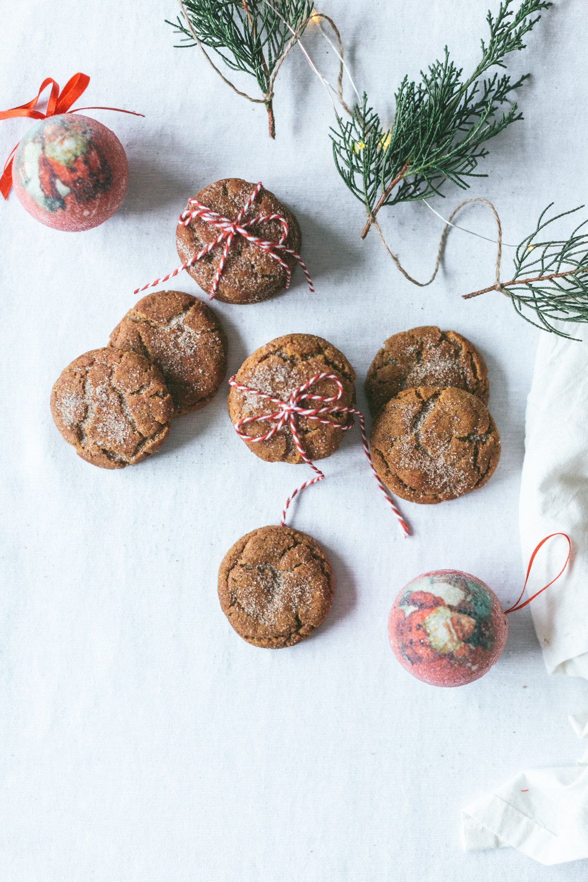 overhead of cookies, some tied up in red and white string