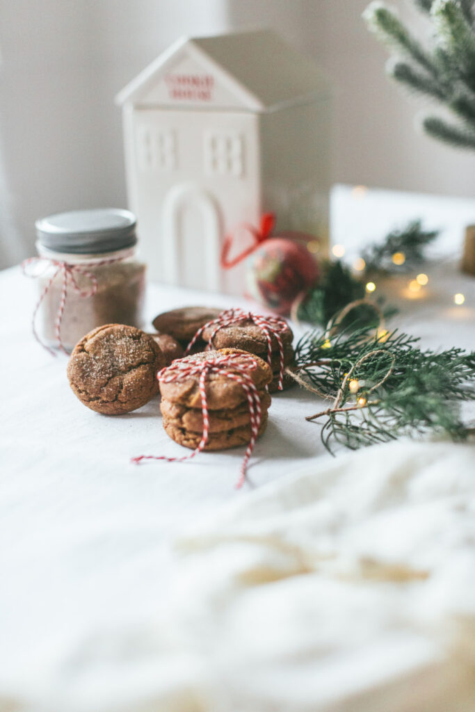 overhead of cookies, some tied up in red and white string