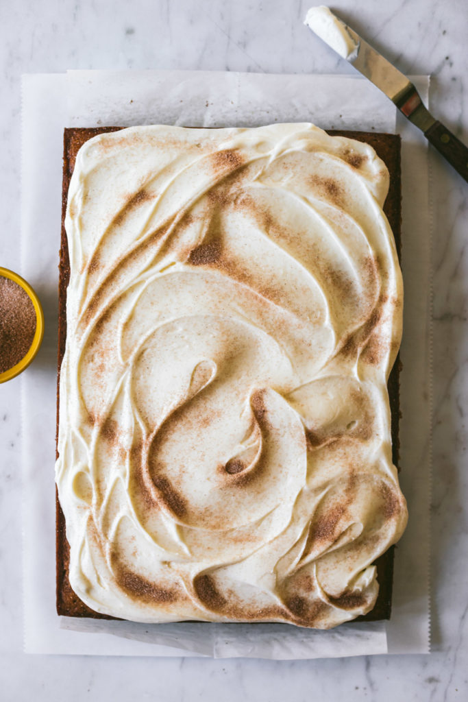 Pumpkin Bars with Browned Butter Cream Cheese Frosting sprinkled with cinnamon and sugar