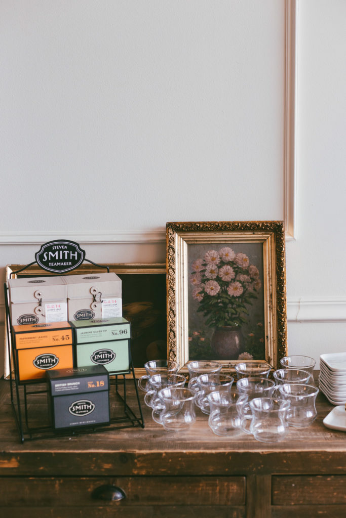 Tea station filled with smith tea boxes and clear tea cups