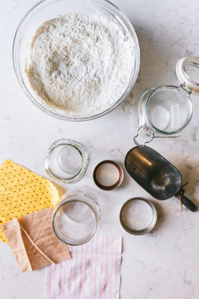 overhead image of empty mason jars ready to be filled with a bowl of pancake mix