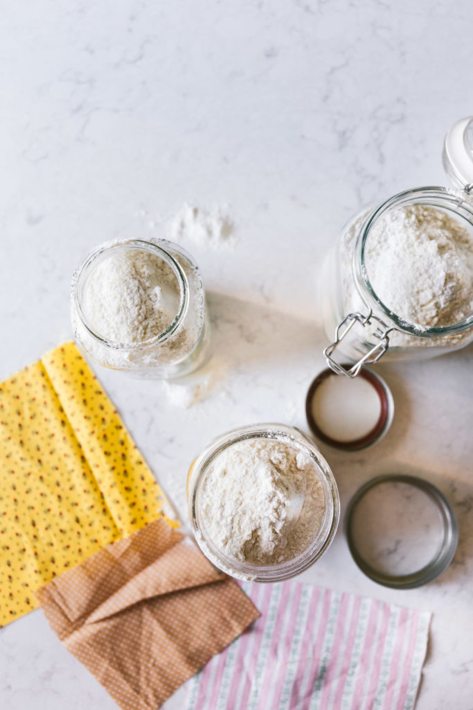 overhead image of three mason jars filled with buttermilk pancake mix