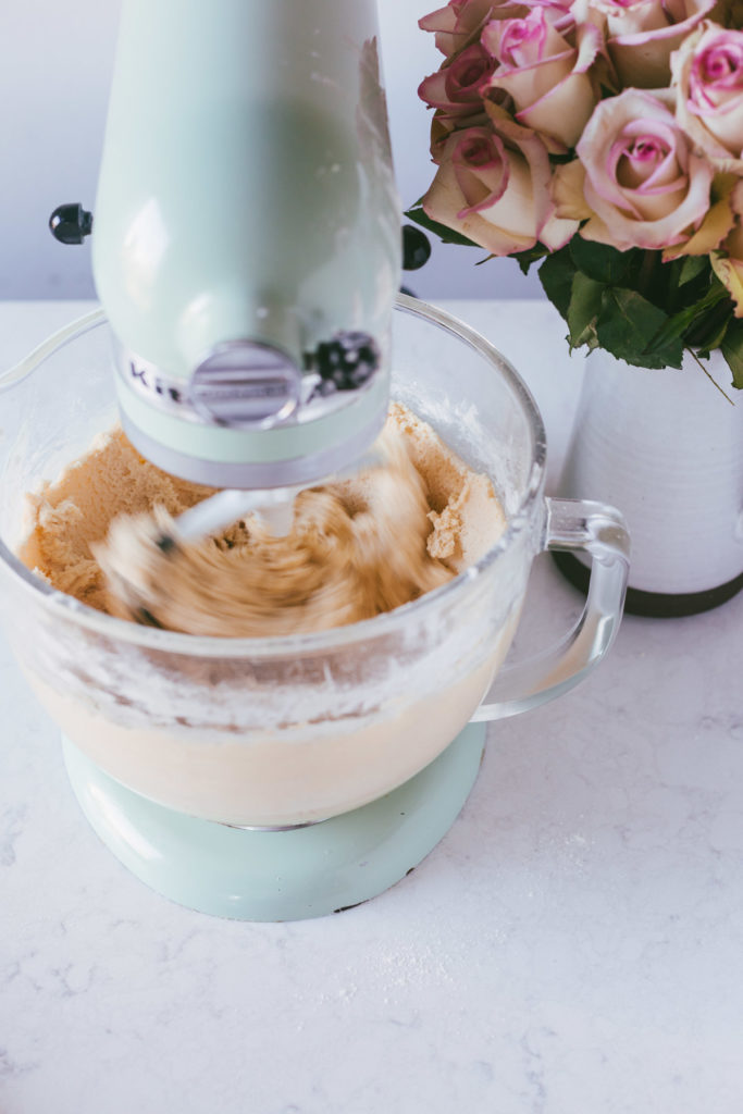 the dough mixing in a kitchen aid mixer