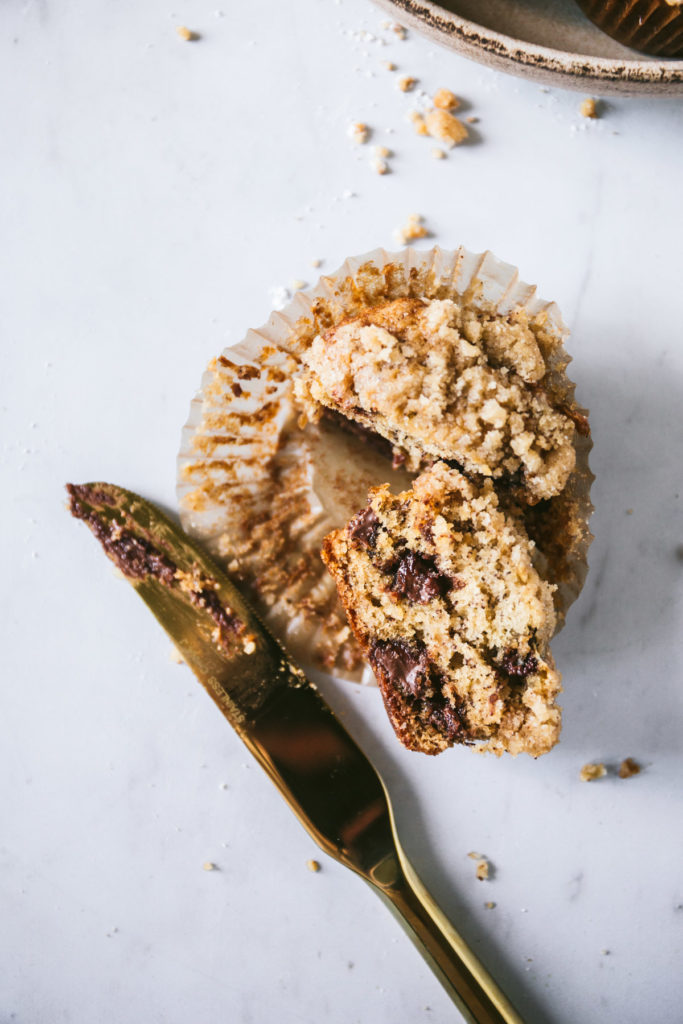 overhead image of one muffin split in half