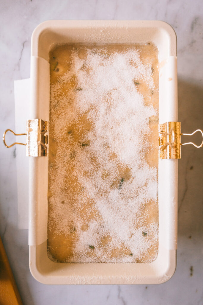 Overhead shot of unbaked zucchinibread with sugar on top