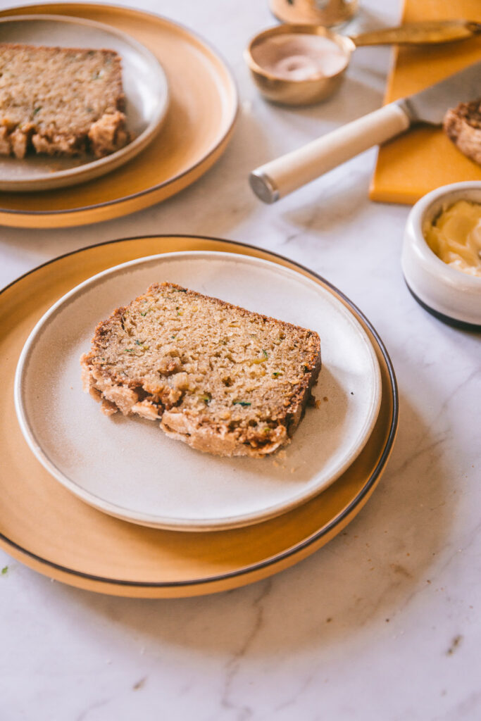 a slices of zucchini bread on plates