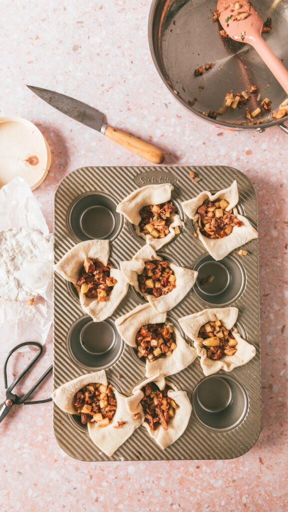 pastry in the muffin tin stuffed with the filling